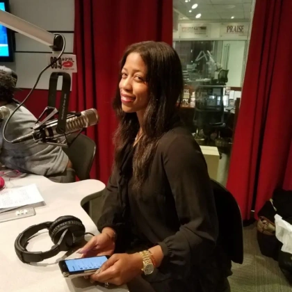 Dr. Angela during a radio station interview