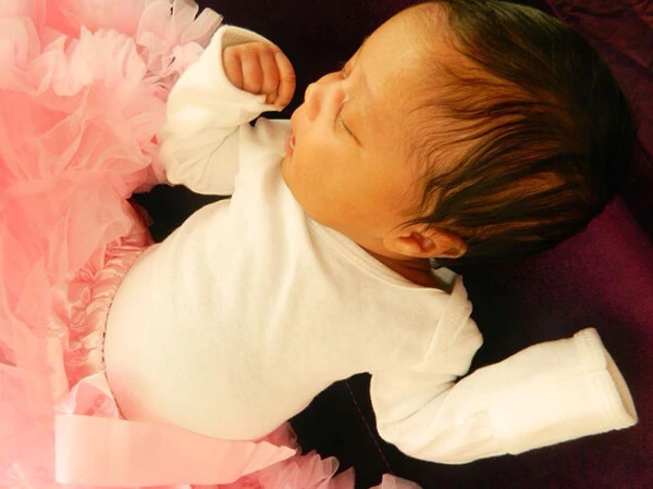 Newborn baby Sage welcomed by the Alexandria Children's Dentistry family following the arrival of Dr. Angela and James' daughter
