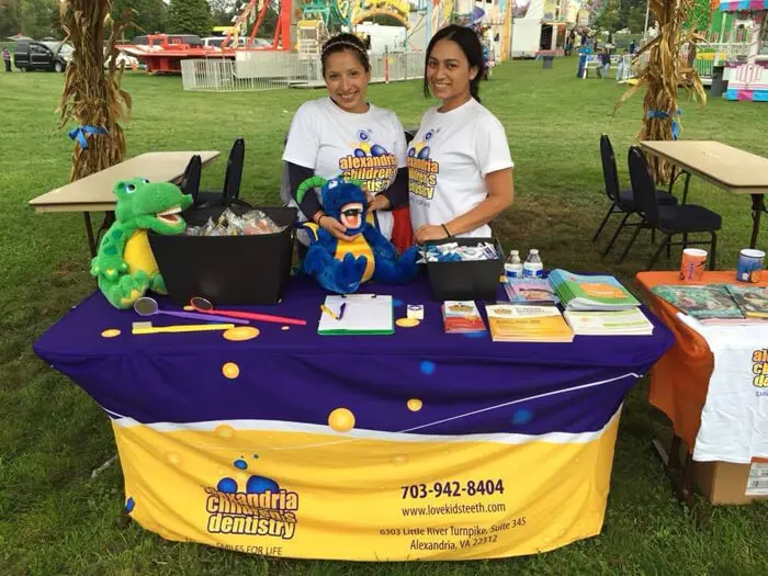 Alexandria Children's Dentistry team welcoming families at Oktober Fest community event