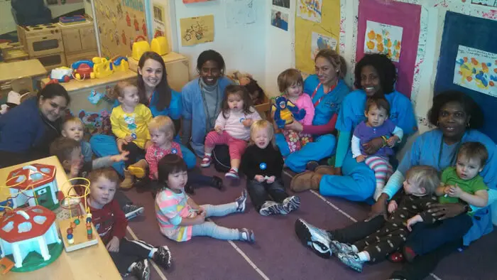 Group of preschool students participating in an Alexandria Children's Dentistry dental health lesson