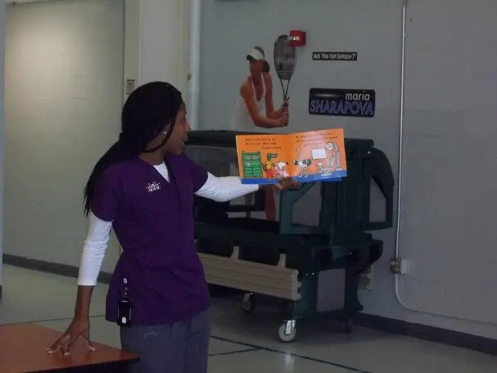 Alexandria Children's Dentistry educator giving a classroom presentation on oral health