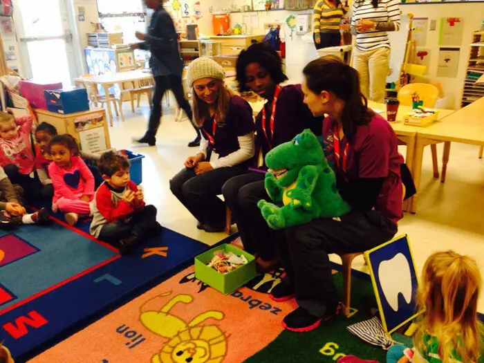 Alexandria Children's Dentistry educator teaching preschool students about healthy smiles