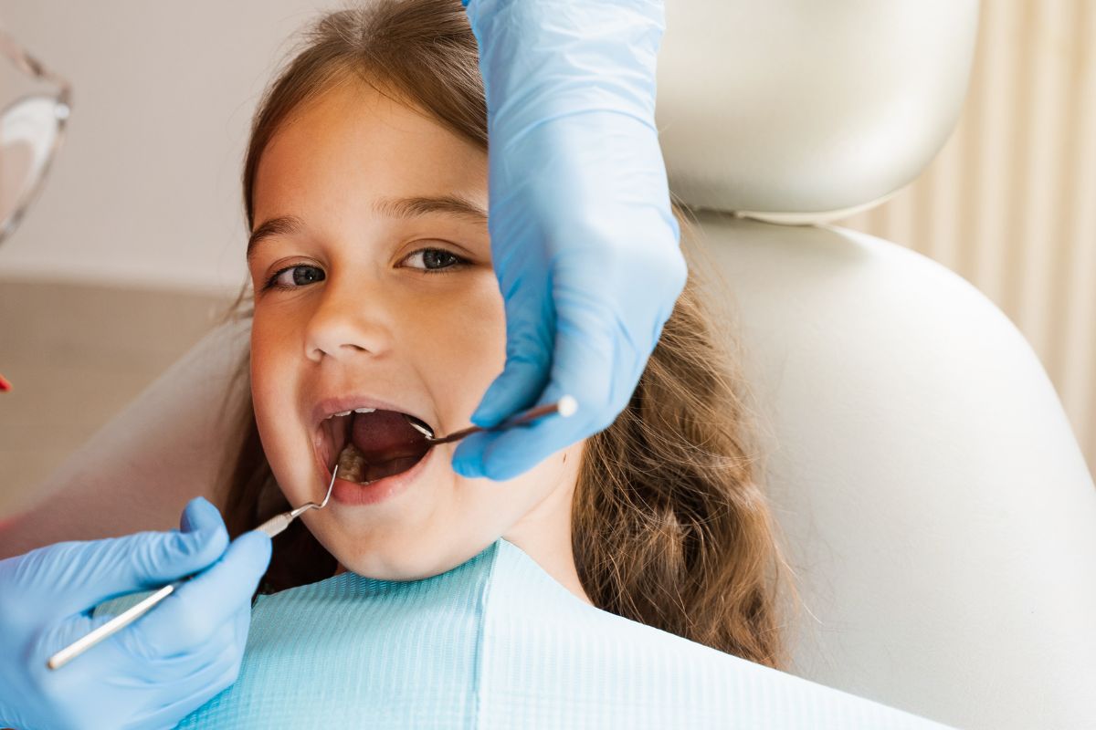 Children dentist in Alexandria caring for sensory-sensitive child